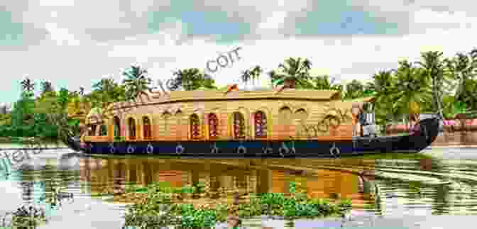 A Boat Navigating The Tranquil Backwaters Of Kerala, India. The Age Of Kali: Travels And Encounters In India (Text Only)