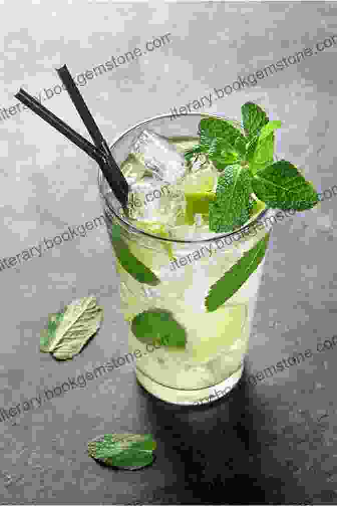 A Mojito, A Classic Cuban Cocktail Made With Rum, Lime Juice, Sugar, And Mint COCKTAILS COOKBOOK: 60 Of The World S Best Cocktail Drink Recipes From The Caribbean How To Mix Them At Home